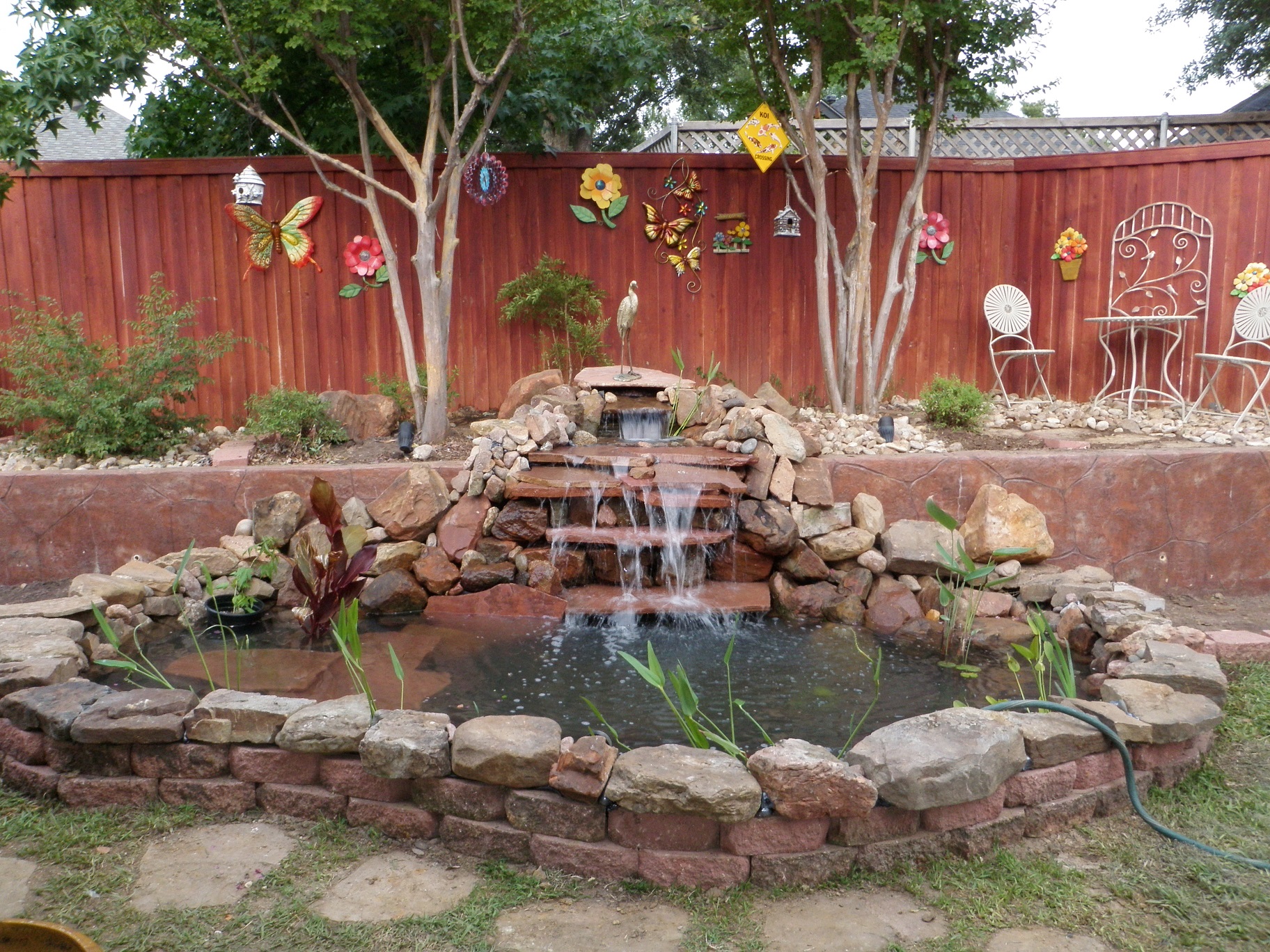 An Incredible Yard with a Wine Fountain Built by @stonebridgepond  #waterfall #pond #koipond #backyard